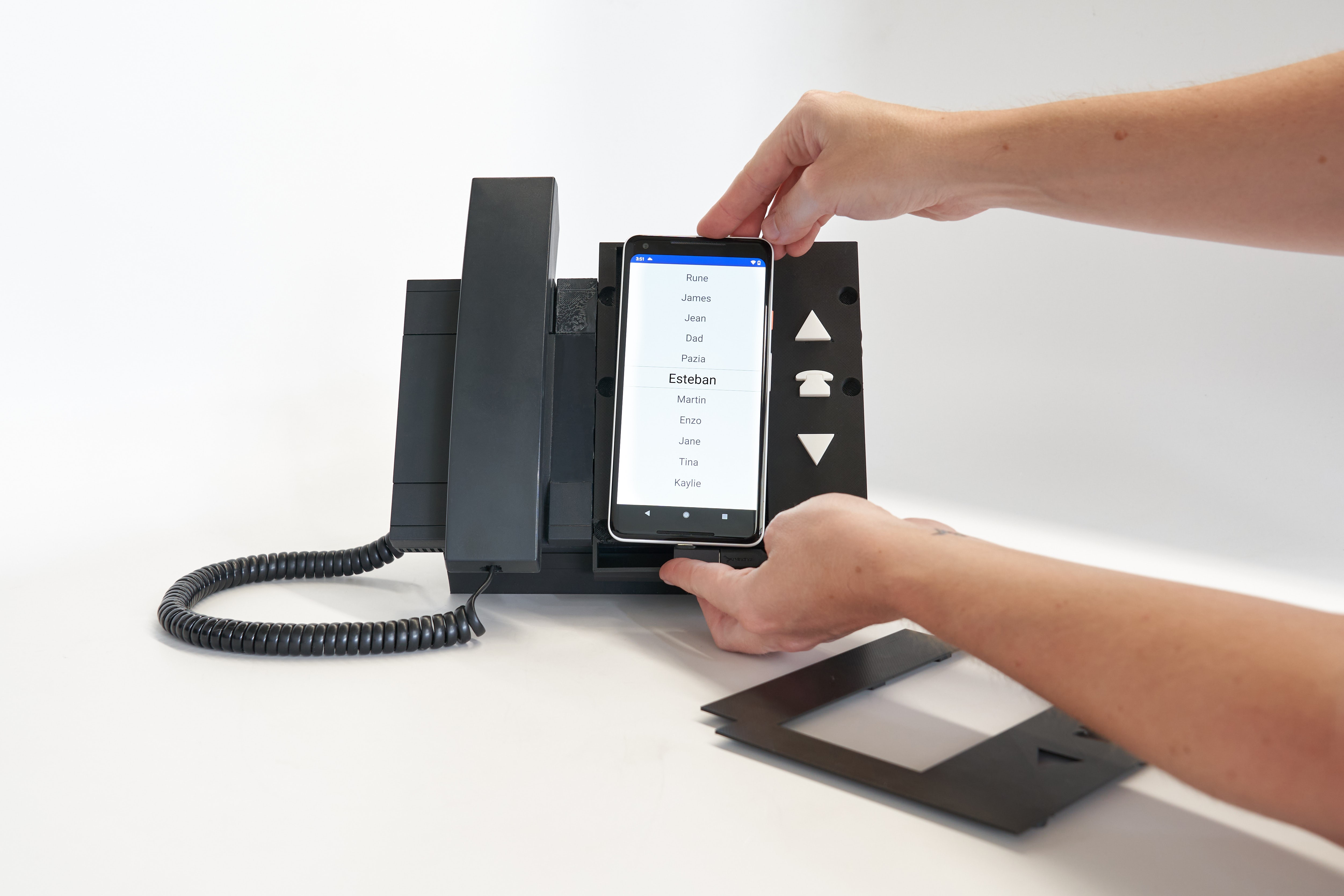 placing the smartphone into the case